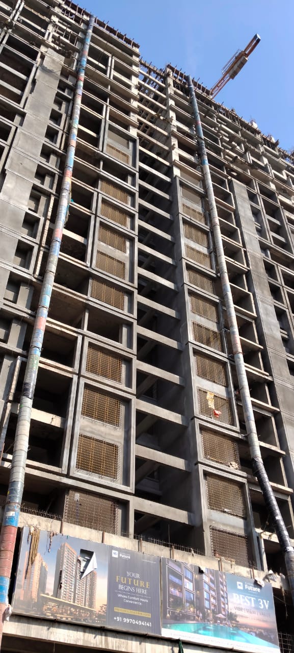 Two full-height debris chutes installed on a high-rise construction project in Pune
